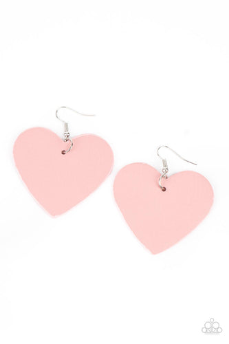 A pink leather heart frame swings from the ear for a flirtatious pop of color. Earring attaches to a standard fishhook fitting. 