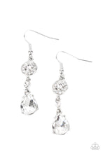 Load image into Gallery viewer, A silver frame dotted in glassy white rhinestones, a solitaire white rhinestone, and an oversized white teardrop gem delicately link into a graceful lure. Earring attaches to a standard fishhook fitting.
