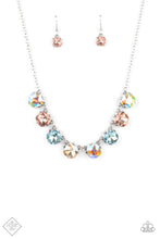 Load image into Gallery viewer, A pretty pastel palette of multicolored rhinestones, set in classic silver pronged fittings, creates sparkle and shine as they dance below the collar. Features an adjustable clasp closure.  Sold as one individual necklace. Includes one pair of matching earrings.  New Kit Fashion Fix Get the Complete Look This complete look features pieces hand-selected by our Paparazzi stylists. Each set has been paired together by coordinating textures, colors, and other design elements to create a flawless cohesive look! 
