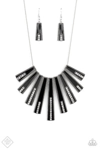 FAN-tascically Deco - Black. Elongated flared frames are painted in a glossy black finish and bordered by studded texture as they fan out along the collar. A row of rhinestones runs up the center of each frame, adding spectacular sparkle to the display as the pieces sway from a round silver chain. Features an adjustable clasp closure. Sold as one individual necklace. Includes one pair of matching earrings.    Available for only $5   To order: Comment Sold  Style #7121
