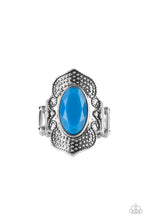 Load image into Gallery viewer, A faceted oval French Blue bead is pressed into the center of a scalloped silver frame dotted in dainty silver studs, creating a trendy centerpiece atop the finger. Features a stretchy band for a flexible fit.
