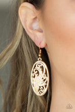 Load image into Gallery viewer, Featuring a high sheen gold finish, elegant frills and dotted designs blossom inside an oval frame create a swirling botanical allure. Earring attaches to a standard fishhook fitting.
