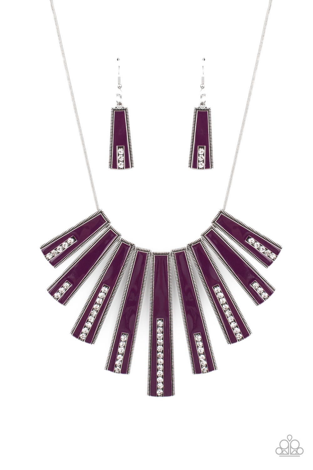 Encased in daintily dotted silver frames, a row of flared silver bars painted in a glossy purple, fans out across the collar. A column of sparkling white rhinestones rises from the bottom of each frame, creating a dramatically deco finish as they sway from a round silver chain. Features an adjustable clasp closure.