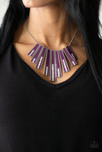 Load image into Gallery viewer, Encased in daintily dotted silver frames, a row of flared silver bars painted in a glossy purple, fans out across the collar. A column of sparkling white rhinestones rises from the bottom of each frame, creating a dramatically deco finish as they sway from a round silver chain. Features an adjustable clasp closure.
