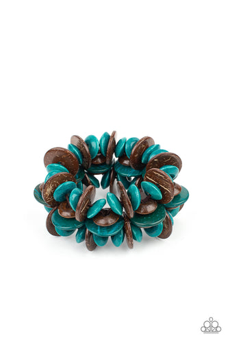 A collection of turquoise and brown disc-shaped wooden beads are threaded along stretchy bands creating a tropical island vibe around the wrist.