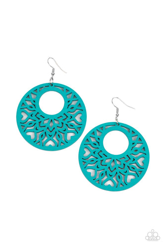 Painted in a refreshing blue, an airy circular wooden frame features a cut-out heart motif reminiscent of bohemian designs creating a free-spirited allure. Earring attaches to a standard fishhook fitting.