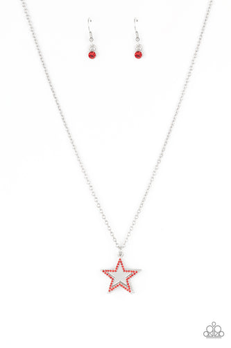 A red rhinestone encrusted silver star delicately overlaps with a shiny silver star below the collar, creating a sparkly patriotic pendant. Features an adjustable clasp closure.