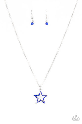 A blue rhinestone encrusted silver star delicately overlaps with a shiny silver star below the collar, creating a sparkly patriotic pendant. Features an adjustable clasp closure.