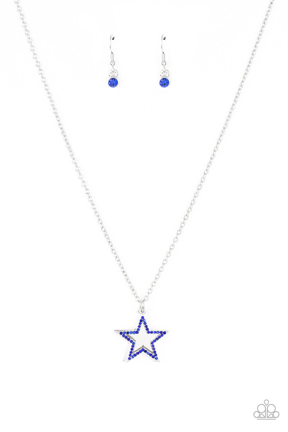 A blue rhinestone encrusted silver star delicately overlaps with a shiny silver star below the collar, creating a sparkly patriotic pendant. Features an adjustable clasp closure.