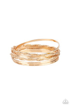 Load image into Gallery viewer, Infused with plain gold bangles, pairs of twisted and faceted gold bracelets stack across the wrist for endless shimmer.  Sold as one set of six bracelets.
