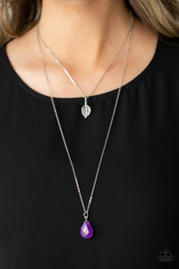 Suspended from layered silver chains, an antiqued leaf pendant gives way to a glistening Amethyst Orchid teardrop gem for a seasonal display across the chest. Features an adjustable clasp closure.