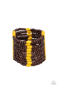 Stacked layers of round wooden beads are threaded along stretchy bands creating a free-spirited statement. Two Illuminating wooden bars connect the strands while vibrant Illuminating accent beads are lined up across the center for an island-inspired vibe. 