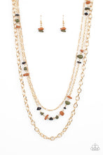 Load image into Gallery viewer, Infused with sections of earthy brown, black, and green stones, a trio of mismatched gold chains layer down the chest for a dash of rustic refinement. Features an adjustable clasp closure.
