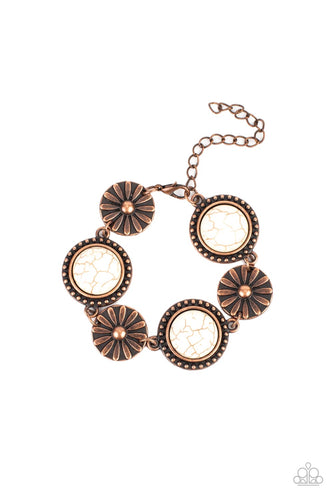 A rustic collection of floral embossed copper frames and copper studded white stone frames delicately connect around the wrist, creating a simply seasonal look. Features an adjustable clasp closure.