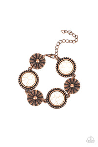 A rustic collection of floral embossed copper frames and copper studded white stone frames delicately connect around the wrist, creating a simply seasonal look. Features an adjustable clasp closure.