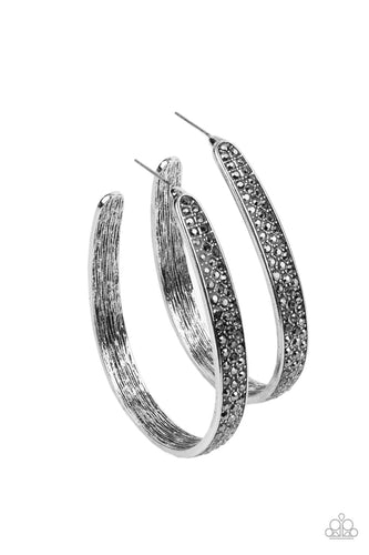 Row after row of smoky hematite rhinestones are encrusted across the front of a textured silver hoop, creating a smoldering centerpiece. Earring attaches to a standard post fitting. Hoop measures approximately 1 1/2