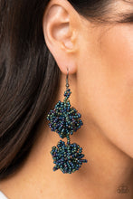 Load image into Gallery viewer, Strands of oil spill seed beads delicately knot into an elegantly clustered lure, creating a stellar modern look. Earring attaches to a standard fishhook fitting.
