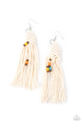 Dainty wooden and colorful beads are knotted in place along a knotted white tassel, creating a beach inspired macramé centerpiece. Earring attaches to a standard fishhook fitting.  Sold as one pair of earrings.