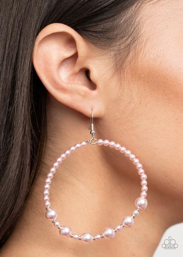 Varying in shape and size, a bubbly array of polished pearly pink and dainty silver accents glide along a wire hoop for a classy finish. Earring attaches to a standard fishhook fitting.