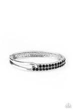 Load image into Gallery viewer, An airy silver fitting links with a silver band encrusted in two rows of glittery black rhinestones across the wrist, creating an edgy bangle-like cuff. Features a hinged closure.  Sold as one individual bracelet.
