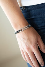 Load image into Gallery viewer, An airy silver fitting links with a silver band encrusted in two rows of glittery black rhinestones across the wrist, creating an edgy bangle-like cuff. Features a hinged closure.  Sold as one individual bracelet.
