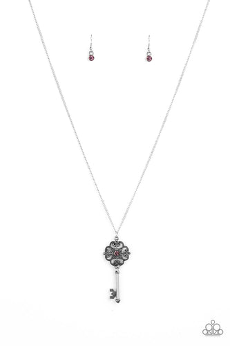 Dotted with a glittery purple rhinestone, a vintage inspired key pendant swings from the bottom of an elegantly elongated silver chain for a whimsical look. Features an adjustable clasp closure.