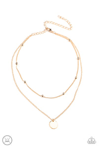 Infused with a gold beaded chain, a dainty gold disc slides along a classic gold chain around the neck, creating sleek layers. Features an adjustable clasp closure.  Sold as one individual choker necklace. Includes one pair of matching earrings.  New Kit Choker