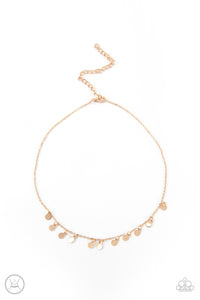 Dainty gold discs swing from a glistening gold chain, creating a shimmery fringe around the neck. Features an adjustable clasp closure.  Sold as one individual choker necklace. Includes one pair of matching earrings.  New Kit Choker