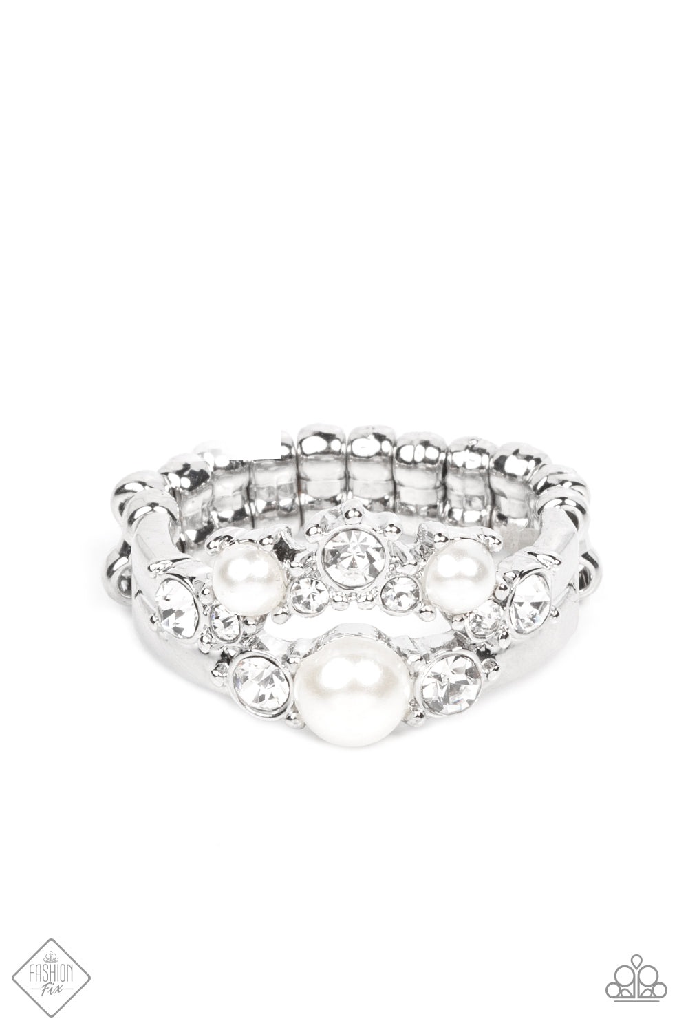Featuring pronged silver fittings, a bubbly collection of white pearls and glassy white rhinestones coalesce into two effervescent bands across the finger. Features a dainty stretchy band for a flexible fit.  Sold as one individual ring.  Fashion Fix New Kit