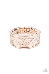 Embossed in a billowy pattern, a dainty rose gold band curls around the finger for a simple and refined fashion. Features a dainty stretchy band for a flexible fit.
