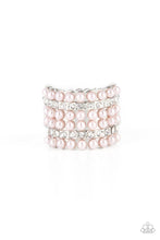 Load image into Gallery viewer, Dainty rows of bubbly pink pearls and glassy white rhinestones alternate across the front of a thick silver band, creating a vintage inspired statement piece. Features a stretchy band for a flexible fit. 
