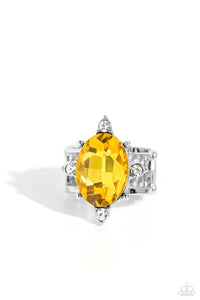 Featuring silver prongs and glassy white rhinestones, an oversized yellow oval gem sits atop two glistening silver bands for a sensational finish. Features a stretchy band for a flexible fit.