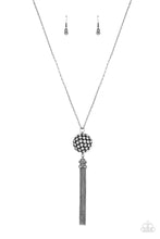 Load image into Gallery viewer, Infused with gunmetal studded fittings, a glittery collection of sparkly white rhinestones coalesce into a dramatic pendant at the bottom of a lengthened gunmetal chain. Capped in a rhinestone dotted frame, a shimmery gunmetal tassel streams out from the blinding pendant for a flirtatious finish. Features an adjustable clasp closure.
