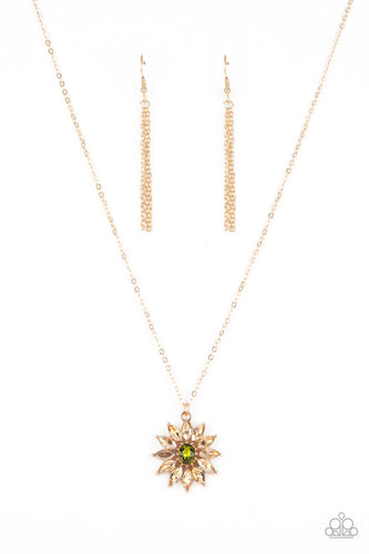 Golden champagne marquise cut rhinestones fan out from an oval green rhinestone center, creating a fabulous floral pendant at the bottom of a dainty gold chain. Features an adjustable clasp closure.