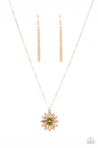 Golden champagne marquise cut rhinestones fan out from an oval green rhinestone center, creating a fabulous floral pendant at the bottom of a dainty gold chain. Features an adjustable clasp closure.