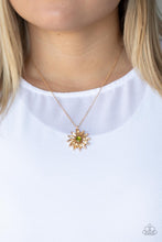 Load image into Gallery viewer, Golden champagne marquise cut rhinestones fan out from an oval green rhinestone center, creating a fabulous floral pendant at the bottom of a dainty gold chain. Features an adjustable clasp closure.
