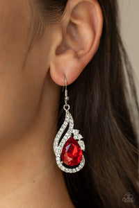 White rhinestone encrusted silver bars delicately whirl around an oversized red teardrop gem, creating a fiery lure. Earring attaches to a standard fishhook fitting.