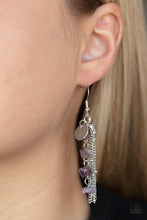 Load image into Gallery viewer, A hammered silver disc, silver chain tassel, and strand of raw cut amethyst rock beads delicately stream from the ear, creating an earthy fringe. Earring attaches to a standard fishhook fitting.
