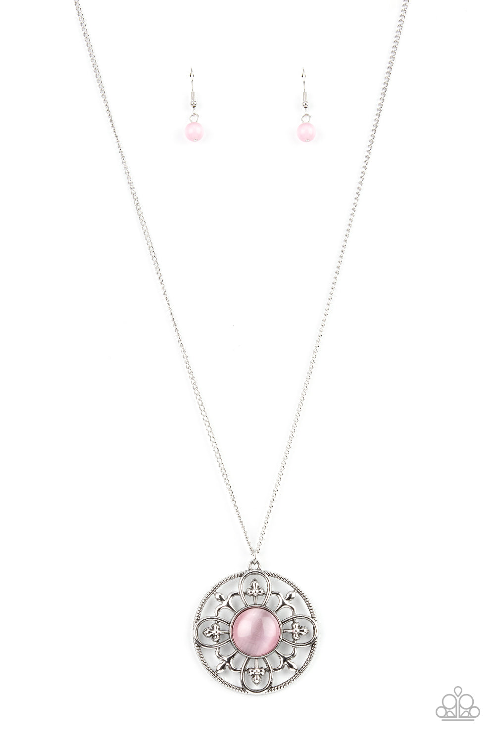 A glowing pink cat's eye stone is pressed into the center of an airy circular frame flowering with fleur de lis-like accents, creating an enchanting pendant at the bottom of a lengthened silver chain. Features an adjustable clasp closure. 