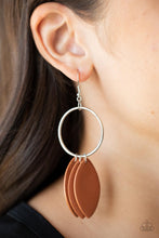 Load image into Gallery viewer, Leafy Adobe leather frames swing from the bottom of a textured silver hoop, creating an earthy fringe. Earring attaches to a standard fishhook fitting.
