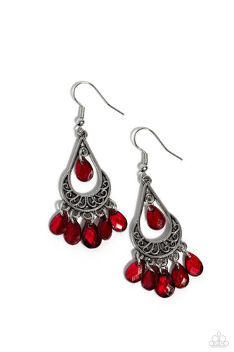 Glassy red teardrop beads swing from the top and bottom of a silver half moon frame embossed in whimsical filigree, creating a flirty fringe. Earring attaches to a standard fishhook fitting.