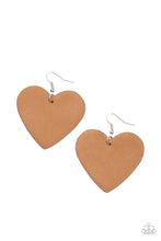 Load image into Gallery viewer, A tan leather heart frame swings from the ear for a flirtatiously neutral pop of color. Earring attaches to a standard fishhook fitting.
