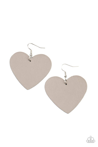 An Ultimate Gray leather heart frame swings from the ear for a flirtatiously neutral pop of color. Earring attaches to a standard fishhook fitting.