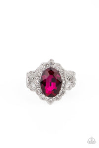 Dotted in dainty white rhinestones, a scalloped silver frame gathers around an oversized pink gem atop ornately studded silver bands for a glitzy look. Features a dainty stretchy band for a flexible fit.