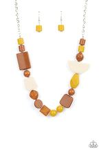 Load image into Gallery viewer, Featuring the rustic hues of Adobe, Mustard, and Soybean, mismatched acrylic and faux rock beads are haphazardly threaded along an invisible wire below the collar for an abstract artisan vibe. Features an adjustable clasp closure. 
