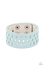 Load image into Gallery viewer, A wide blue leather band is filled with patterned rows of small diamond-shaped cutouts giving the illusion of diamonds floating across the wrist in a whimsical fashion. Features an adjustable snap closure.
