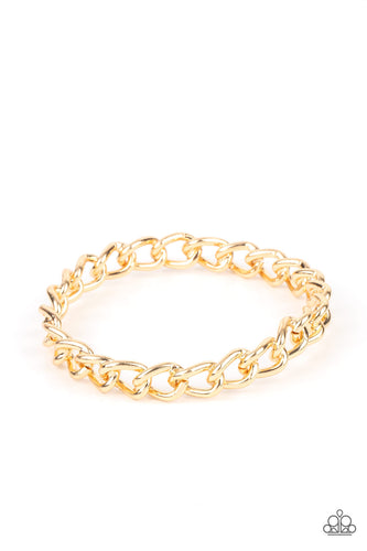 A single strand of bold gold chain links into a solid bangle around the wrist for an intense industrial fashion. 