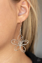 Load image into Gallery viewer, Shiny silver wire delicately twists into oversized blossoms. Varying in size, the airy floral frames delicately link into an asymmetrical display as the layered frames elegantly pop beneath the collar. Features an adjustable clasp closure.
