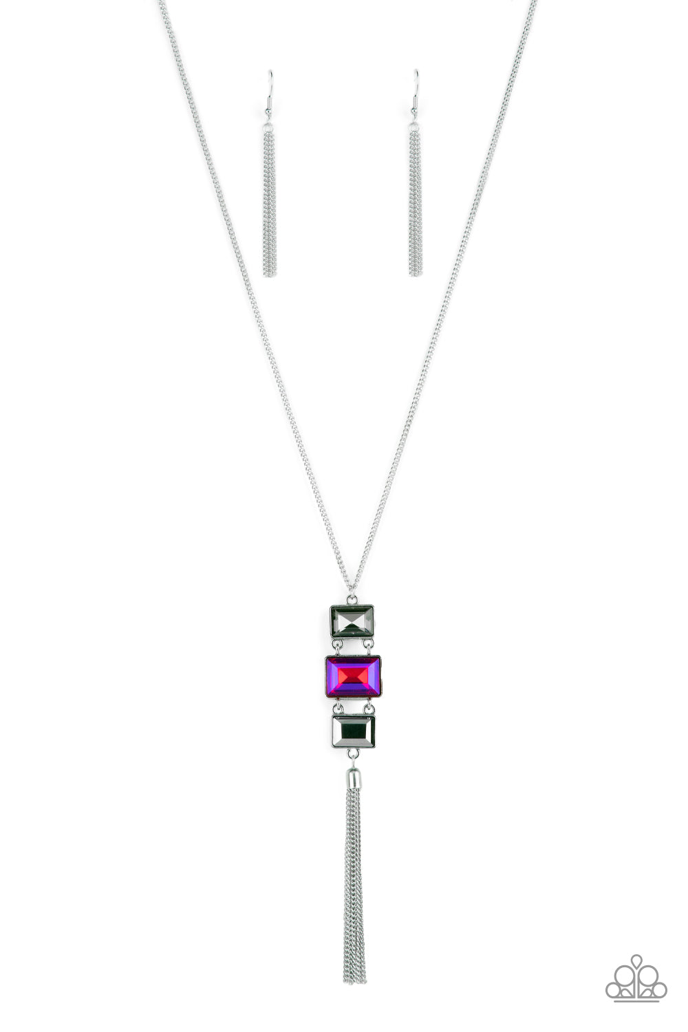 A sparkly collection of mismatched smoky, pink, and hematite rectangular gems stack at the bottom of a lengthened silver chain, creating a glamorous pendant. A dainty silver chain tassel swings from the bottom, adding glamorous movement to the modern display. Features an adjustable clasp closure. 