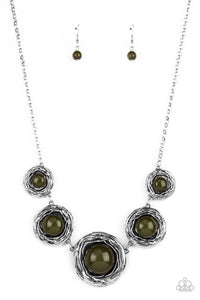 Gradually increasing in size, a bubbly collection of oversized Olive Branch beads adorn the centers of folds of silver buds below the collar for a seasonal fashion. Features an adjustable clasp closure.